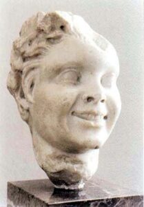 Figura 200 - Testa di satiro giovane, sec. II. Museo Archeologico di Tarragona. (Spagna).